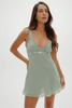 Pale sage green mini dress with ribbon and ruffles